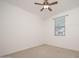 Cozy bedroom with a ceiling fan and a bright window at 1965 N 213Th Dr, Buckeye, AZ 85396