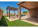 Inviting backyard with a pergola and pool at 19889 W Sherman St, Buckeye, AZ 85326