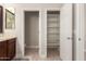 Bathroom featuring a vanity, open closet, and a separate water closet at 19889 W Sherman St, Buckeye, AZ 85326