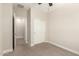 Bedroom featuring carpet flooring, neutral paint, ceiling fan, and a closet at 19889 W Sherman St, Buckeye, AZ 85326