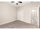 Neutral bedroom with carpet and a ceiling fan offers a calm, quiet space at 19889 W Sherman St, Buckeye, AZ 85326