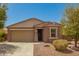 Charming single-story home featuring a two-car garage and desert landscaping for low maintenance at 19889 W Sherman St, Buckeye, AZ 85326