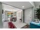 Bright dining area featuring a chandelier and an open view to the outdoor patio at 212 Leisure World --, Mesa, AZ 85206