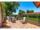 Serene outdoor space featuring a tiled patio with comfortable seating, views of the surrounding landscape, and a tranquil atmosphere at 212 Leisure World --, Mesa, AZ 85206