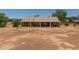 Large backyard offering potential for landscaping or agricultural use, complemented by a covered patio at 22201 E Vallejo St, Queen Creek, AZ 85142