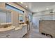 Contemporary bathroom with dual sinks, glass shower, and modern fixtures at 22201 E Vallejo St, Queen Creek, AZ 85142