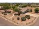 Charming single-story home featuring low-maintenance landscaping and a welcoming desert aesthetic at 22201 E Vallejo St, Queen Creek, AZ 85142