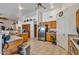 Bright kitchen with stainless steel appliances, wooden cabinets, and tiled flooring at 22201 E Vallejo St, Queen Creek, AZ 85142
