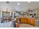 Open-concept kitchen with a dining area and stainless steel appliances at 22201 E Vallejo St, Queen Creek, AZ 85142