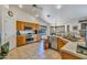Well-equipped kitchen with wood cabinets and modern appliances; a chef's delight at 22201 E Vallejo St, Queen Creek, AZ 85142