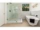 Luxurious bathroom features a separate glass shower, freestanding tub, and stylish fixtures at 27713 N 57Th Dr, Phoenix, AZ 85083