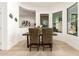 Cozy dining area with light walls, ample natural light, and stylish furnishings at 27713 N 57Th Dr, Phoenix, AZ 85083