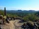 Scenic hiking trail with desert views and rocky terrain at 27713 N 57Th Dr, Phoenix, AZ 85083