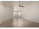 Spacious living room with lots of natural light and open layout, featuring modern flooring at 319 N Riata St, Gilbert, AZ 85234