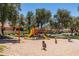 Bright and colorful playground area with slides, swings, and play equipment at 319 N Riata St, Gilbert, AZ 85234