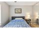 Cozy bedroom with stylish decor, plush bedding, and mirrored closet doors at 3505 S Westfall Ave, Tempe, AZ 85282