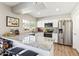 Bright kitchen featuring granite countertops, white cabinetry, and stainless steel appliances at 3505 S Westfall Ave, Tempe, AZ 85282