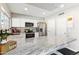 Well-lit kitchen with stainless steel appliances, granite countertops, and ample cabinet space at 3505 S Westfall Ave, Tempe, AZ 85282