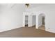 Spacious bedroom with an open closet and bathroom access featuring neutral carpet and light walls at 3510 E Hampton Ave # 18, Mesa, AZ 85204