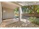 Cozy backyard with a covered patio, desert landscaping, shade tree, and block fence at 3534 E Linda Ln, Gilbert, AZ 85234