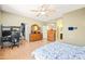 Comfortable bedroom with wood flooring, closet access, and an adjacent bathroom, ideal for relaxation and organization at 3534 E Linda Ln, Gilbert, AZ 85234