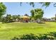 Community playground with large grassy area and tiered landscaping for seating and watching children play at 3534 E Linda Ln, Gilbert, AZ 85234