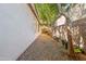The side yard is low maintenance with desert landscaping and a mature shade tree at 3534 E Linda Ln, Gilbert, AZ 85234