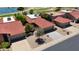 Aerial view showing the red tile roof, two car garage, and lush landscaping at 4225 E Sandia St, Phoenix, AZ 85044