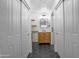 This hallway bathroom features hexagon tile flooring, and modern vanity at 4225 E Sandia St, Phoenix, AZ 85044