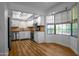 Bright and airy updated kitchen with stainless steel appliances, a window view, and breakfast nook at 4225 E Sandia St, Phoenix, AZ 85044