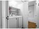 The laundry room has a washer, a dryer, and direct access to the bathroom at 4225 E Sandia St, Phoenix, AZ 85044
