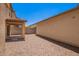 The backyard features neutral gravel for low maintenance, and a covered patio for enjoying the outdoors at 5113 E Greenway E St, Mesa, AZ 85205
