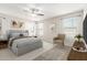 Virtual staged primary bedroom with neutral walls, plush carpeting and a calming aesthetic at 5113 E Greenway E St, Mesa, AZ 85205