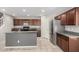 Modern kitchen featuring granite countertops, ample cabinet space, and stainless steel appliances at 5113 E Greenway E St, Mesa, AZ 85205