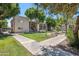 Well-maintained community grounds feature lush green lawns, mature trees, and convenient walkways at 520 N Stapley Dr # 134, Mesa, AZ 85203