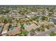 Listing image of an aerial view of real estate with multiple pools in a residential neighborhood at 6102 E Aster Dr, Scottsdale, AZ 85254