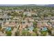 Overhead shot features a home with a backyard oasis, swimming pool, manicured landscaping, and a neighborhood setting at 6102 E Aster Dr, Scottsdale, AZ 85254
