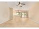 Bedroom featuring a ceiling fan and a view of the backyard at 6102 E Aster Dr, Scottsdale, AZ 85254