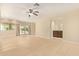 Bedroom featuring tiled flooring and access to a bathroom at 6102 E Aster Dr, Scottsdale, AZ 85254