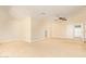 Bedroom featuring a ceiling fan, tiled floor, and closet access at 6102 E Aster Dr, Scottsdale, AZ 85254