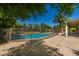 Fenced pool area, including landscaping and privacy fence in a well-manicured backyard at 6102 E Aster Dr, Scottsdale, AZ 85254
