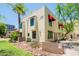 Attractive apartment complex with desert landscaping, red awnings and a green lawn at 620 N 4Th Ave # 10, Phoenix, AZ 85003