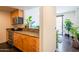 View of the kitchen featuring wooden cabinets and granite countertop at 620 N 4Th Ave # 10, Phoenix, AZ 85003