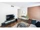 Contemporary living room with TV, modern decor, and a cozy rug at 620 N 4Th Ave # 10, Phoenix, AZ 85003