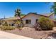Attractive single-Gathering house showcasing desert-style landscaping and a well-maintained exterior at 6820 E Pinchot Ave, Scottsdale, AZ 85251