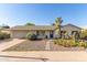 Charming single-story home featuring desert landscaping and a cozy entrance walkway at 6820 E Pinchot Ave, Scottsdale, AZ 85251