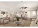 Spacious living room featuring wood floors, neutral paint, and modern furnishings at 6820 E Pinchot Ave, Scottsdale, AZ 85251