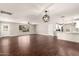 Inviting living area boasting hardwood floors, modern lighting, and an open floor plan at 6820 E Pinchot Ave, Scottsdale, AZ 85251