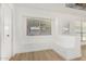 Bright dining room area with a built in bench and lots of natural light at 7139 W Mcrae Way, Glendale, AZ 85308