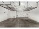 Large garage features a storage system and concrete floor at 7139 W Mcrae Way, Glendale, AZ 85308